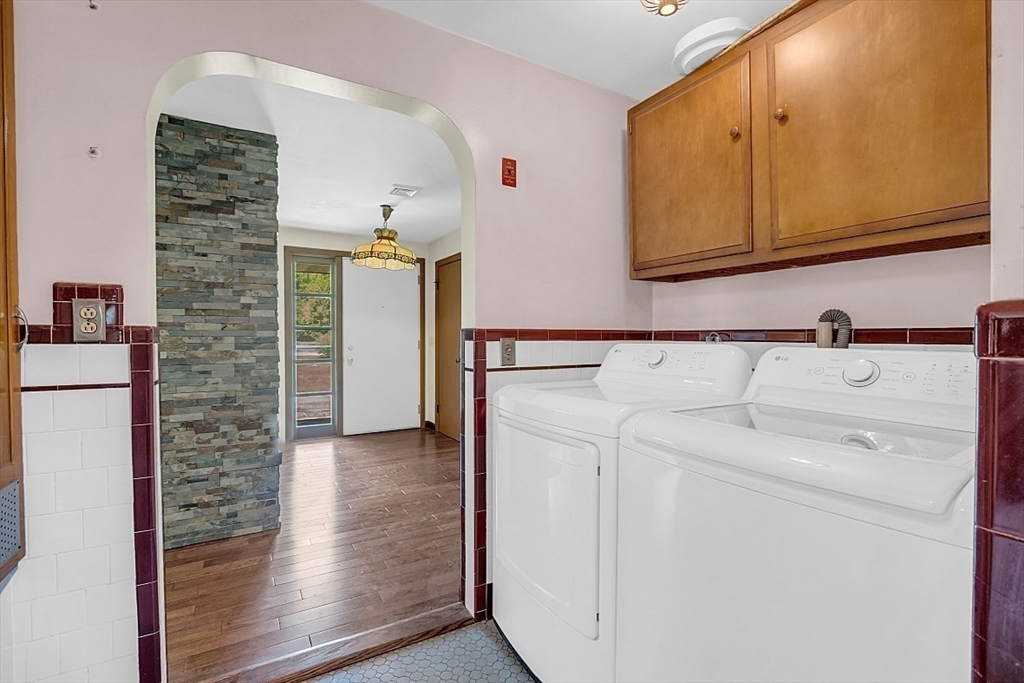 233 West Acton Road Stow, MA 01775 - Photo 16 of 41 a utility room with dryer and washer