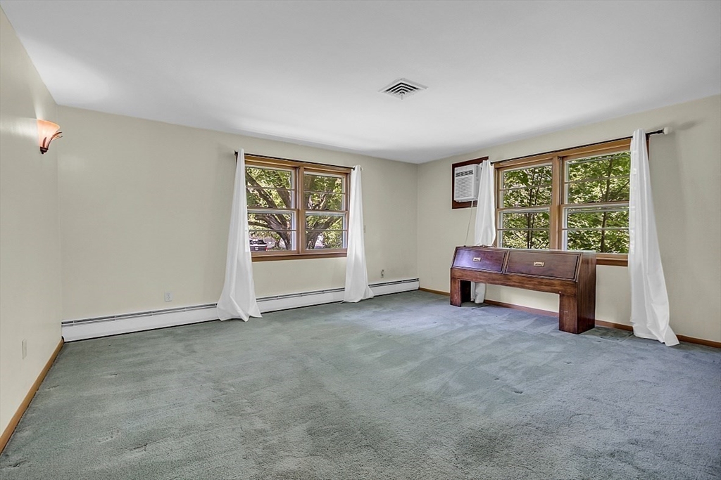 233 West Acton Road Stow, MA 01775 - Photo 19 of 41 a view of an empty room with a window