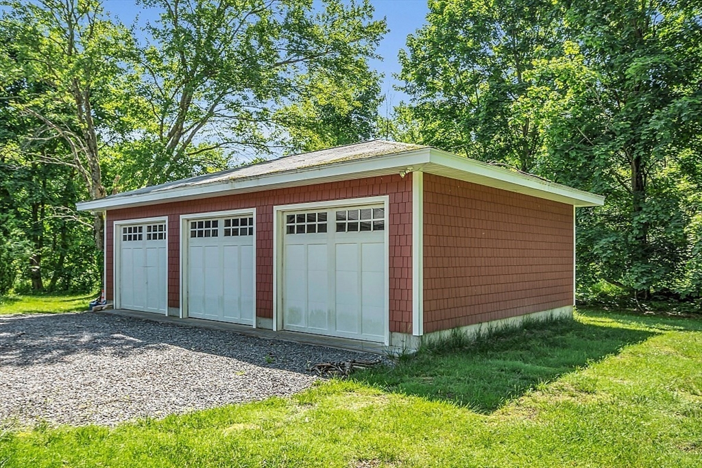 233 West Acton Road Stow, MA 01775 - Photo 2 of 41 a front view of house with yard