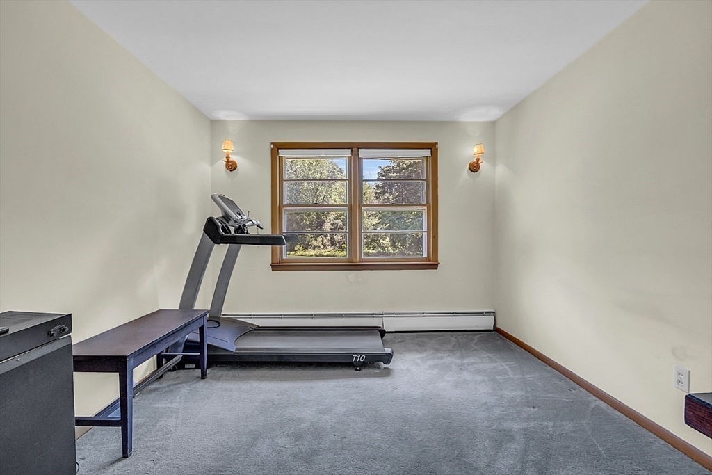 233 West Acton Road Stow, MA 01775 - Photo 25 of 41 a room with gym equipment and a window