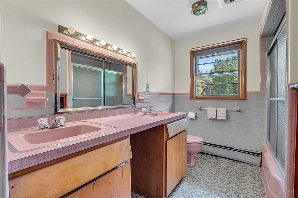 233 West Acton Road Stow, MA 01775 - Photo 26 of 41 a bathroom with a double vanity sink mirror and toilet
