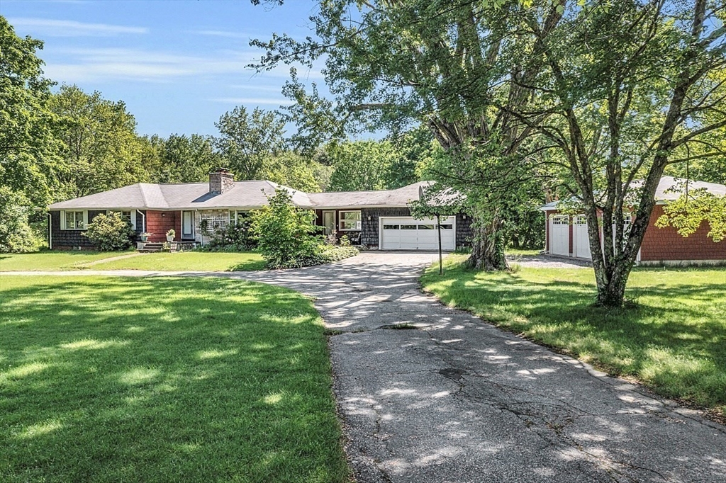 233 West Acton Road Stow, MA 01775 - Photo 3 of 41 a view of a house with a yard