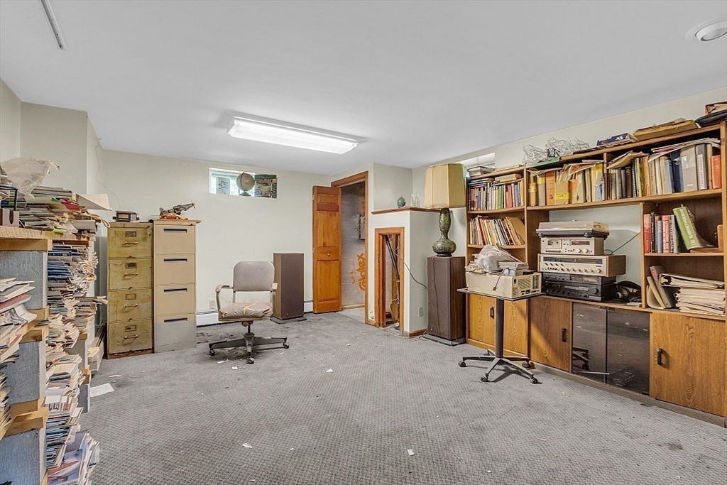 233 West Acton Road Stow, MA 01775 - Photo 32 of 41 a view of a workspace with furniture