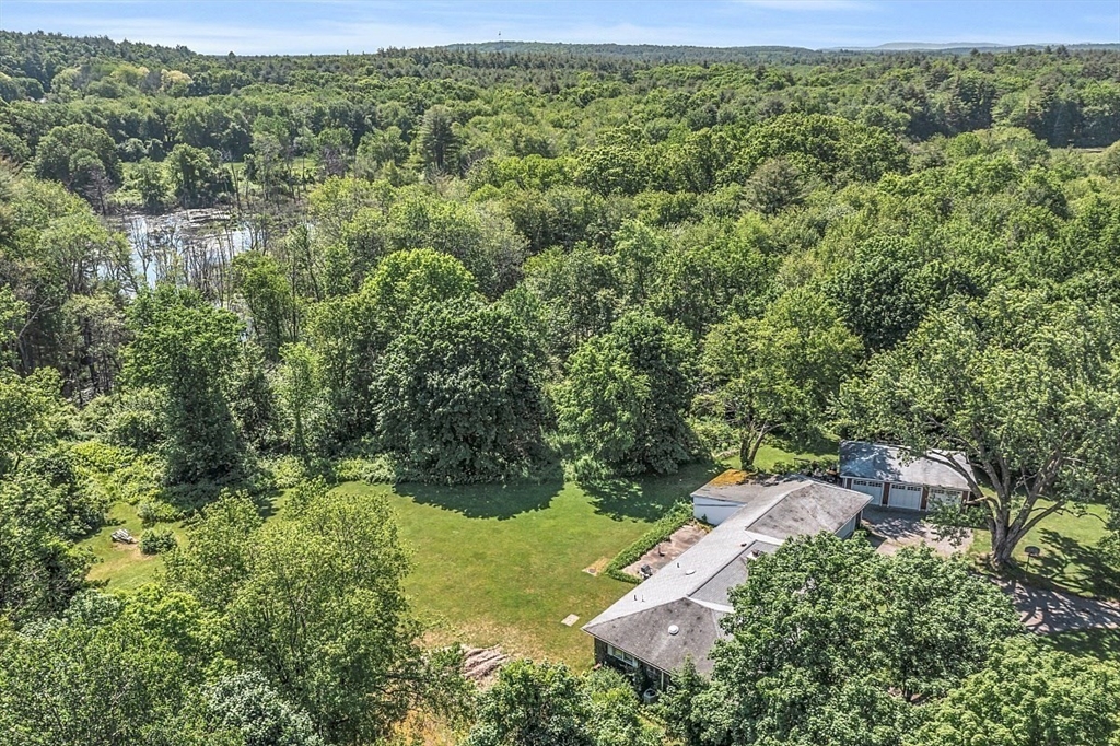 233 West Acton Road Stow, MA 01775 - Photo 37 of 41 an aerial view of a house with a yard