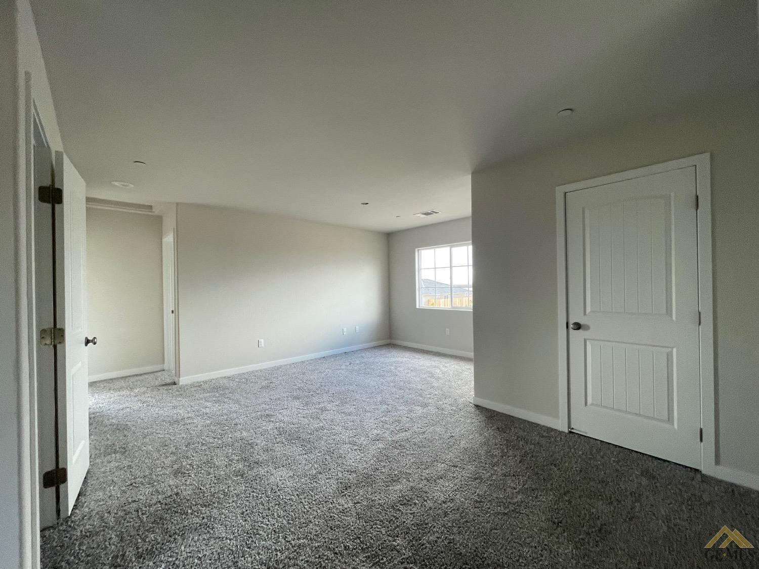 Undisclosed Address Bakersfield, CA 93311 - Photo 5 of 8 a view of an empty room and window