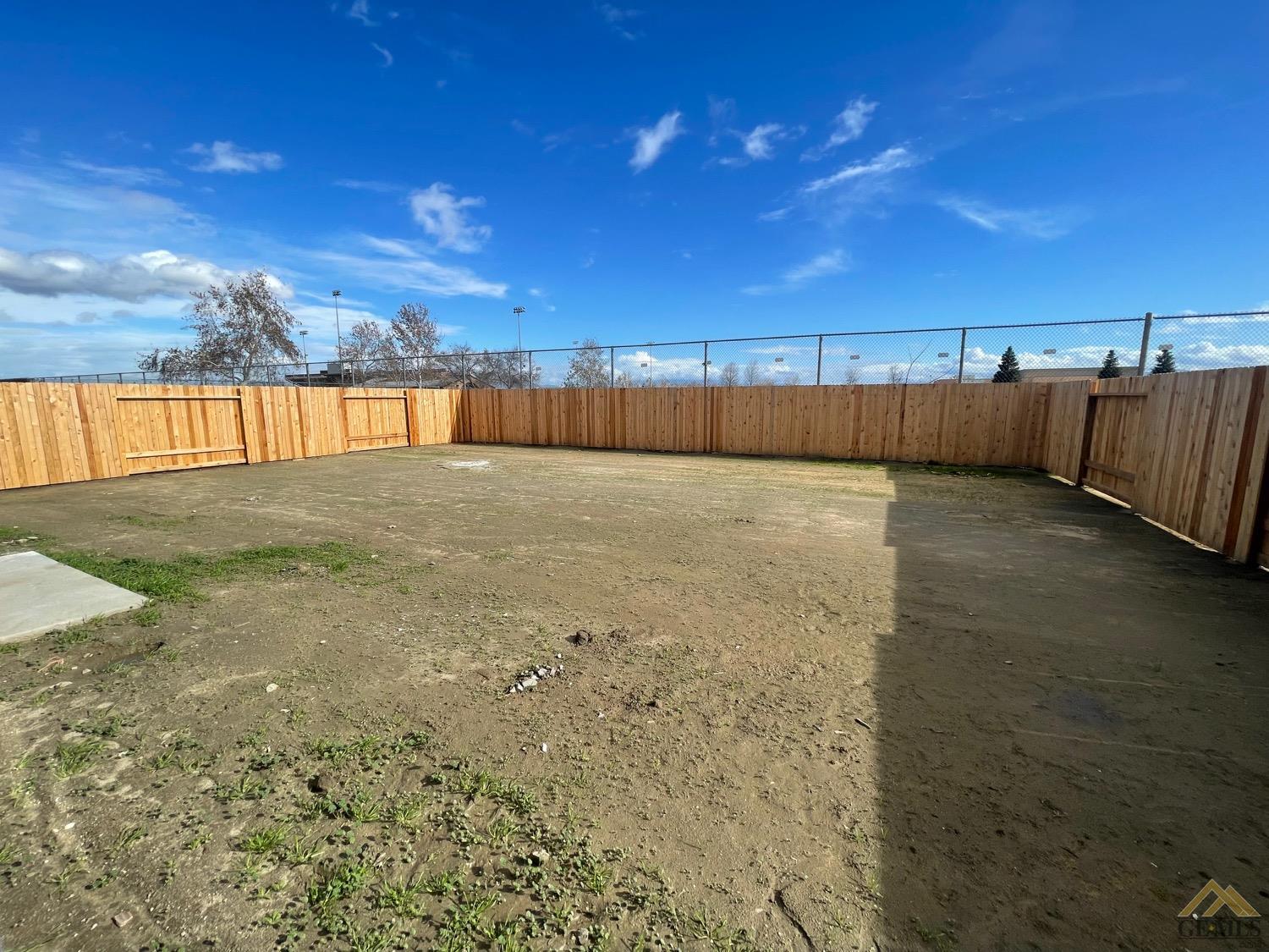 Undisclosed Address Bakersfield, CA 93311 - Photo 7 of 8 a view of an outdoor space and a yard