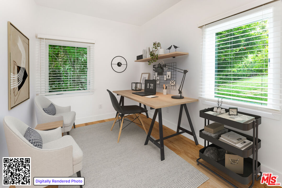1253 South Rimpau Boulevard Los Angeles, CA 90019 - Photo 58 of 71 a view of a livingroom with furniture and a window