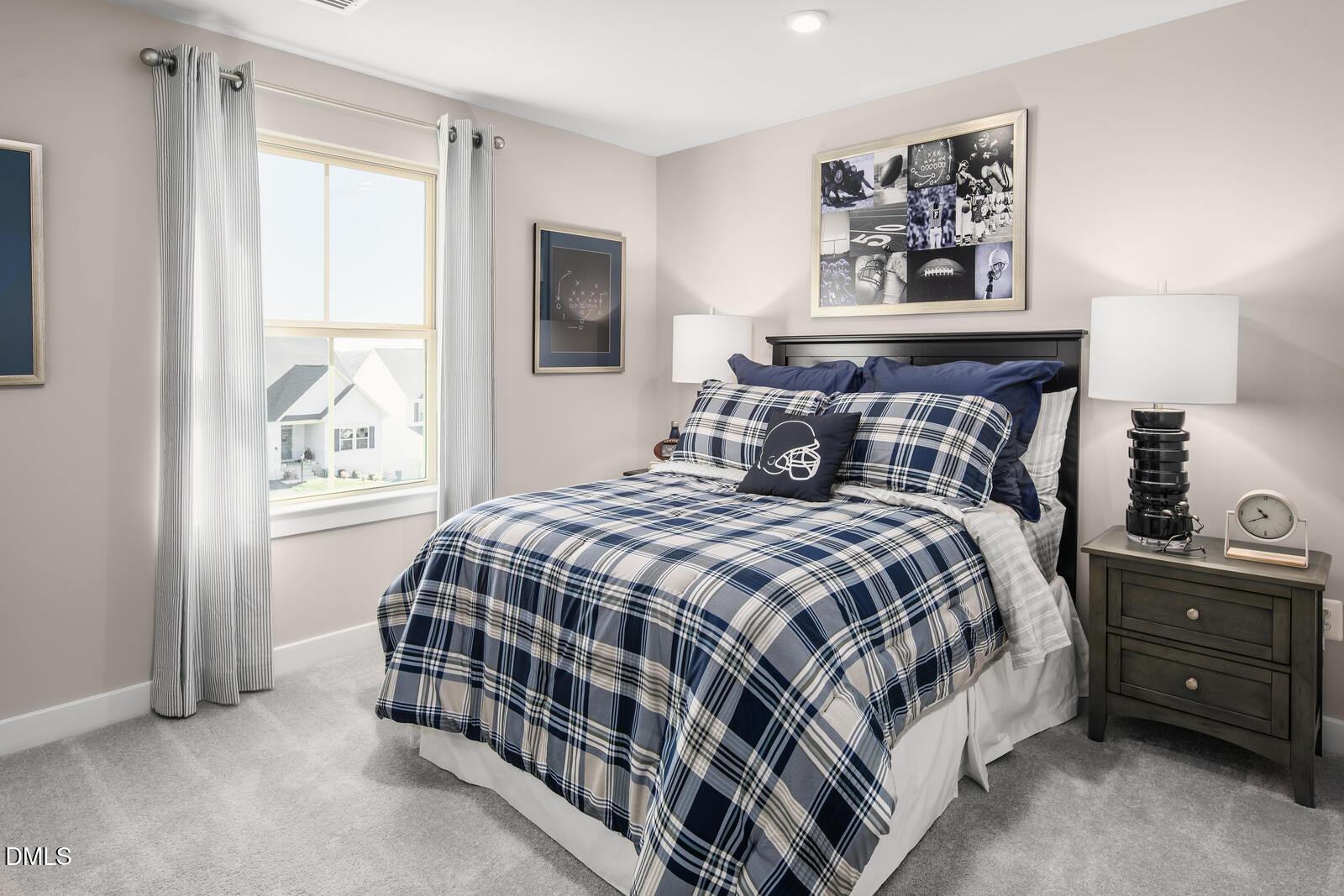 844 Walker Rdg Way Willow Spring, NC 27592 - Photo 16 of 21 a bedroom with a bed a painting on the wall and a window