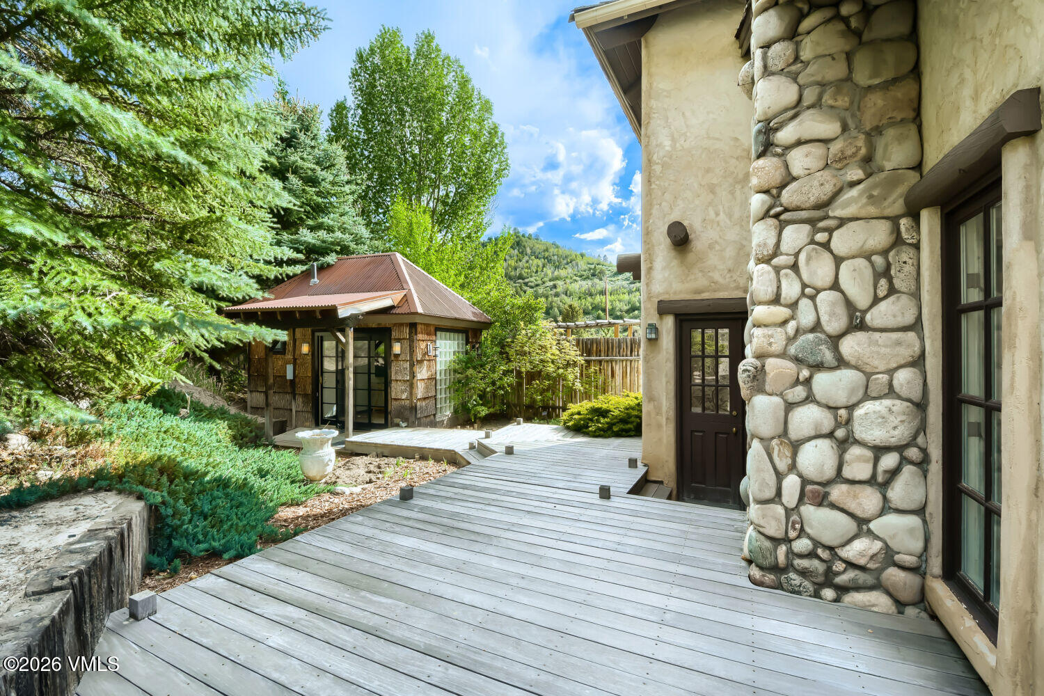 1644 Squaw Creek Road Edwards, CO 81632 - Photo 18 of 21 an outdoor space with wooden benches