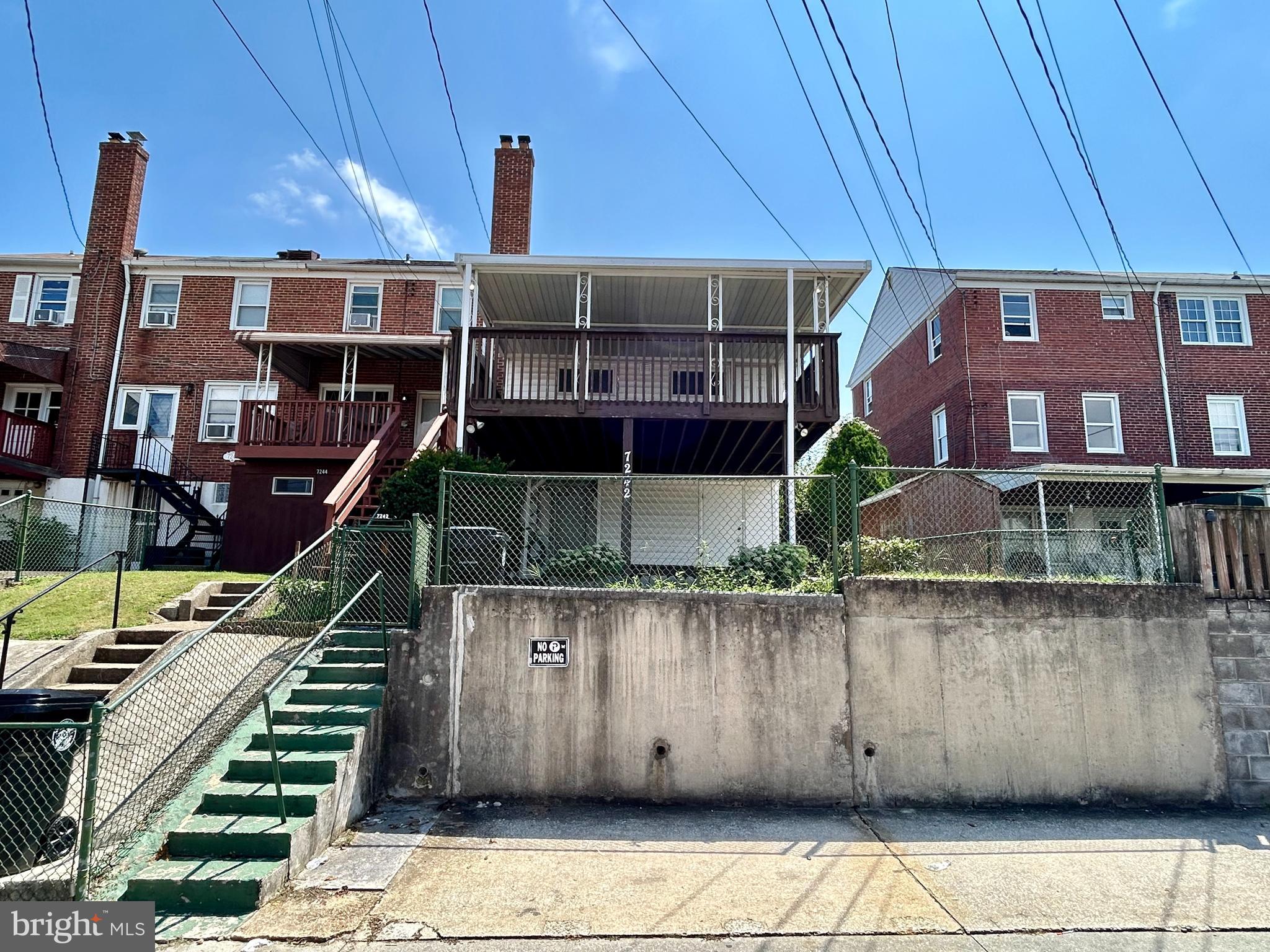 7242 Conley Street Baltimore, MD 21224 - Photo 17 of 18 a view of a house with a balcony