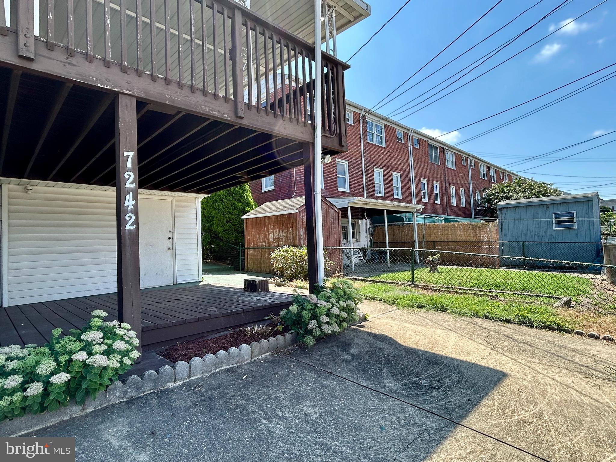 7242 Conley Street Baltimore, MD 21224 - Photo 18 of 18 a view of a house with a yard