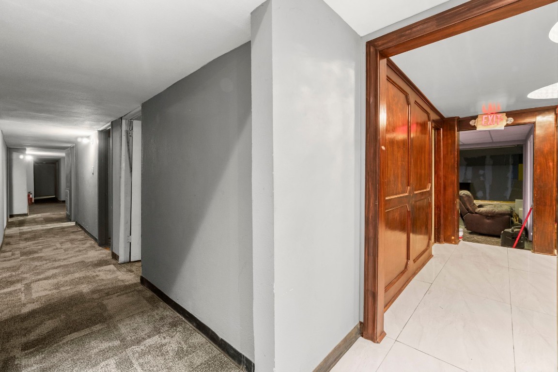 1018 Shaver Street Pasadena, TX 77506 - Photo 16 of 43 a view of a hallway to rooms