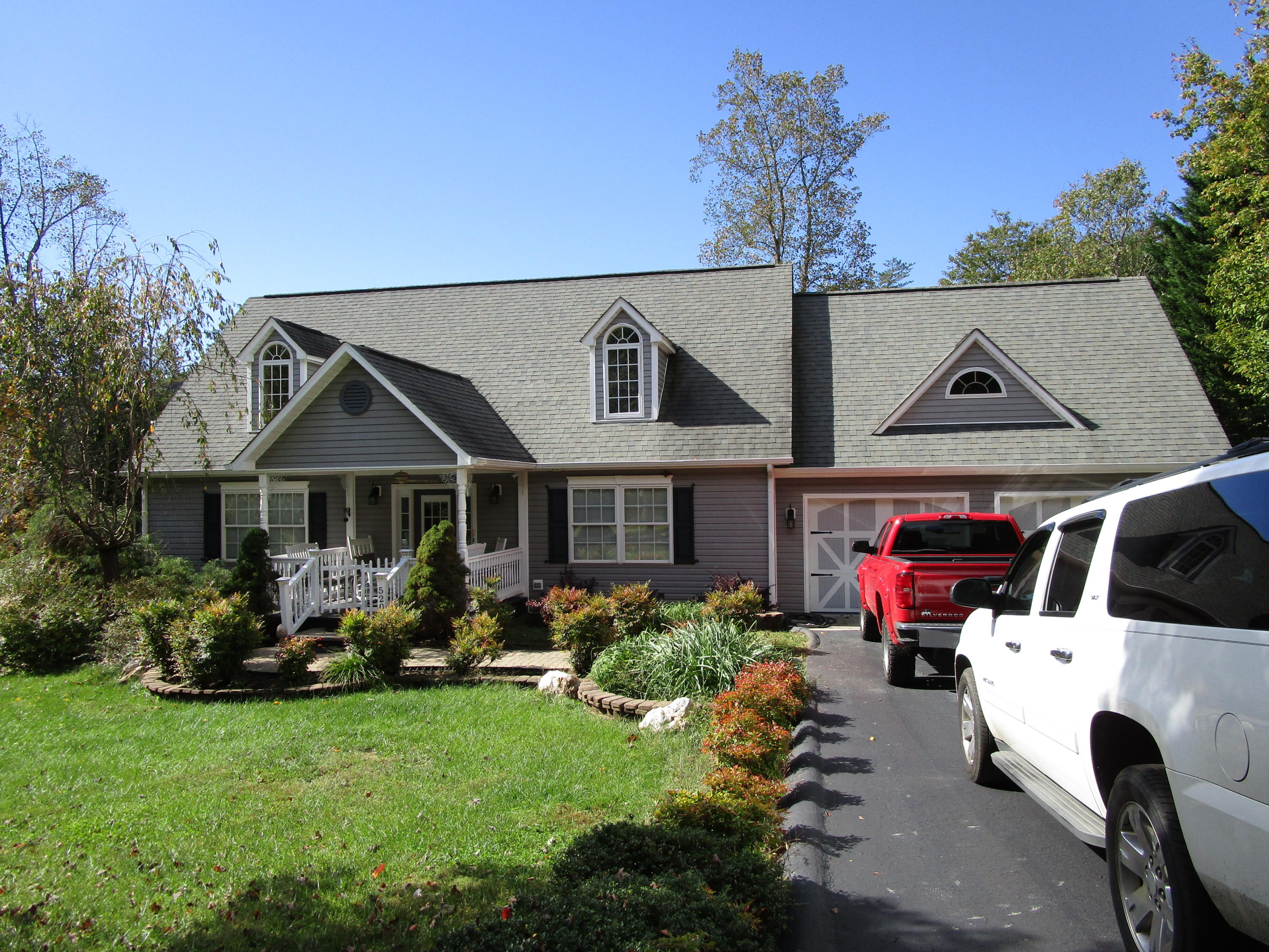 520 Green Level Road Boones Mill, VA 24065 - Photo 2 of 43 a front view of house with yard outdoor seating and green space