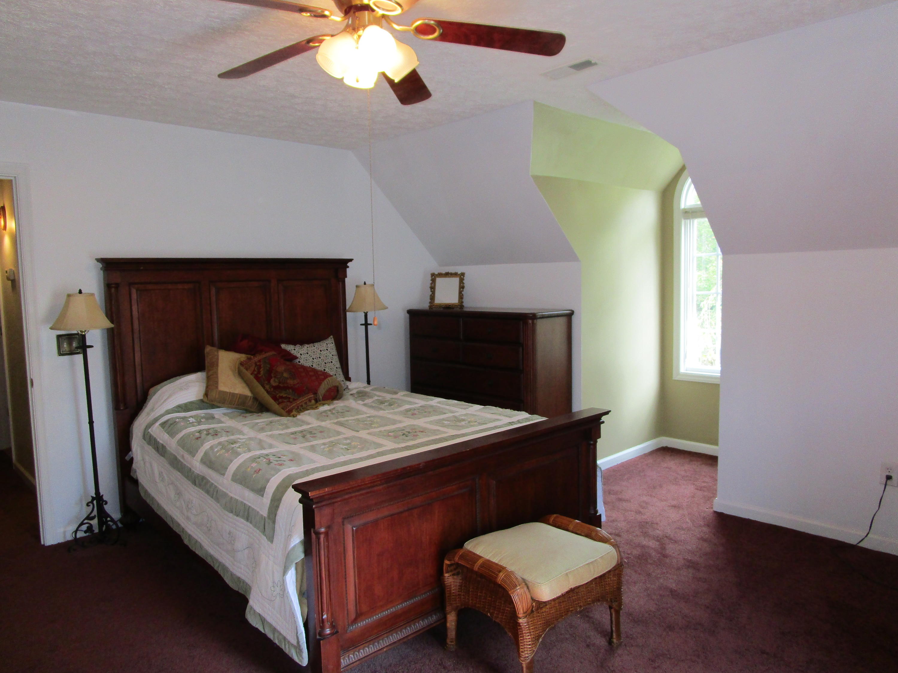 520 Green Level Road Boones Mill, VA 24065 - Photo 22 of 43 a bedroom with a bed and a dresser