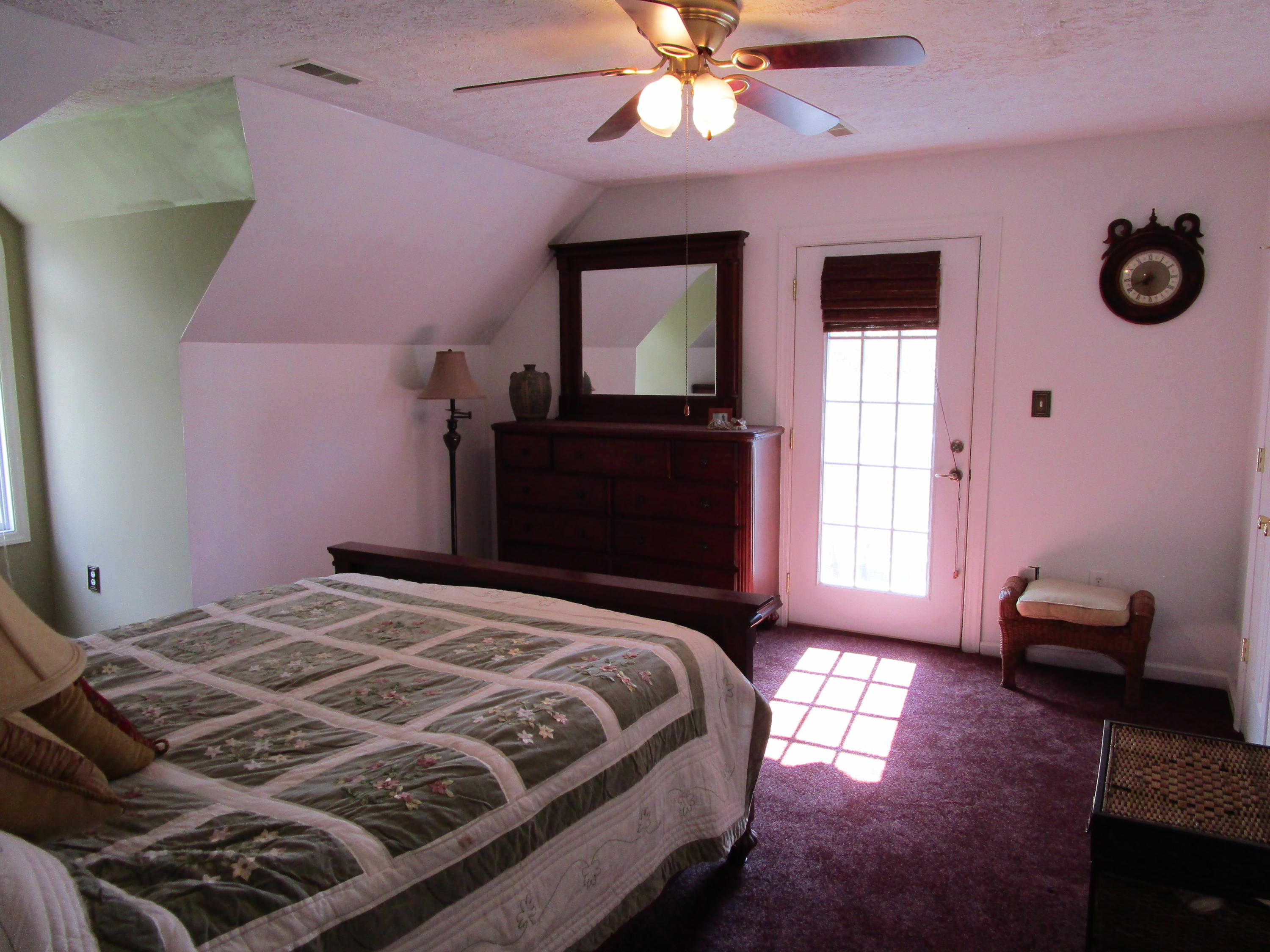 520 Green Level Road Boones Mill, VA 24065 - Photo 23 of 43 a bedroom with a bed and a window