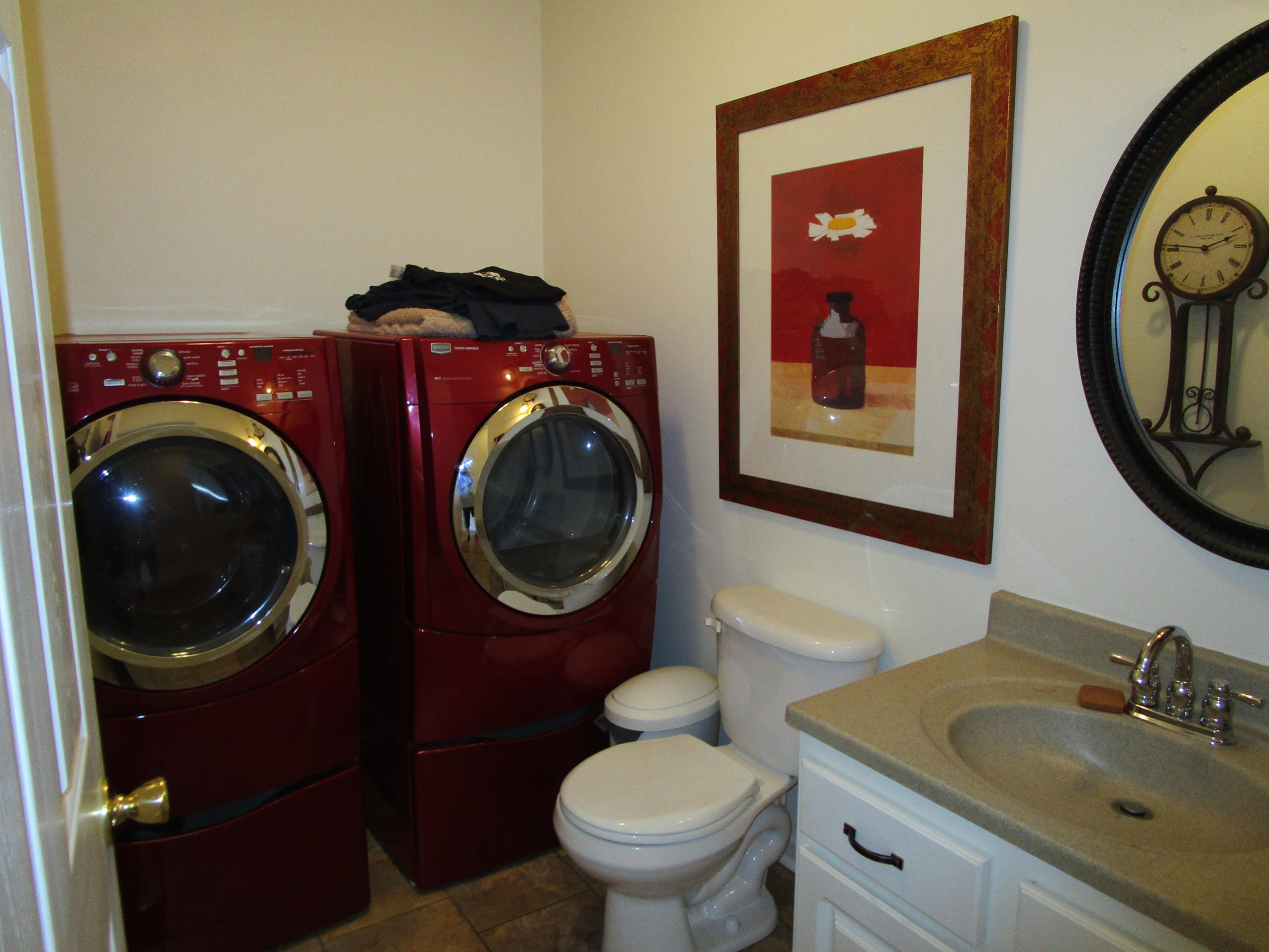 520 Green Level Road Boones Mill, VA 24065 - Photo 31 of 43 a bathroom with a toilet a sink and mirror