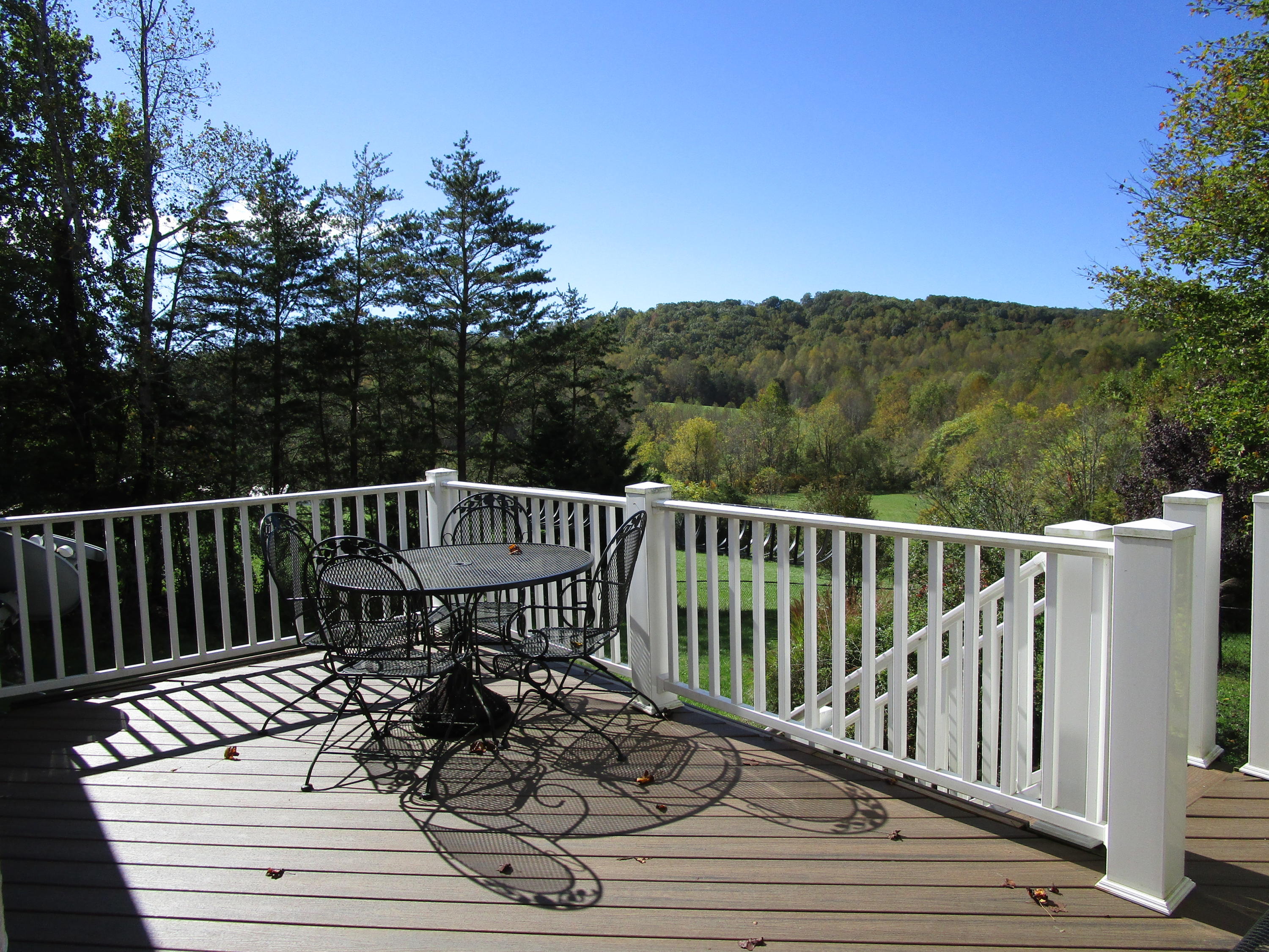 520 Green Level Road Boones Mill, VA 24065 - Photo 38 of 43 a view of a two chairs on the roof deck