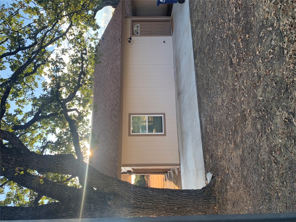 119 Faubion Drive, Unit B Georgetown, TX 78628 - Photo 1 of 7 a view of a house with a yard