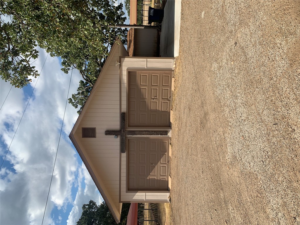 119 Faubion Drive, Unit B Georgetown, TX 78628 - Photo 2 of 7 a view of garage yard and deck