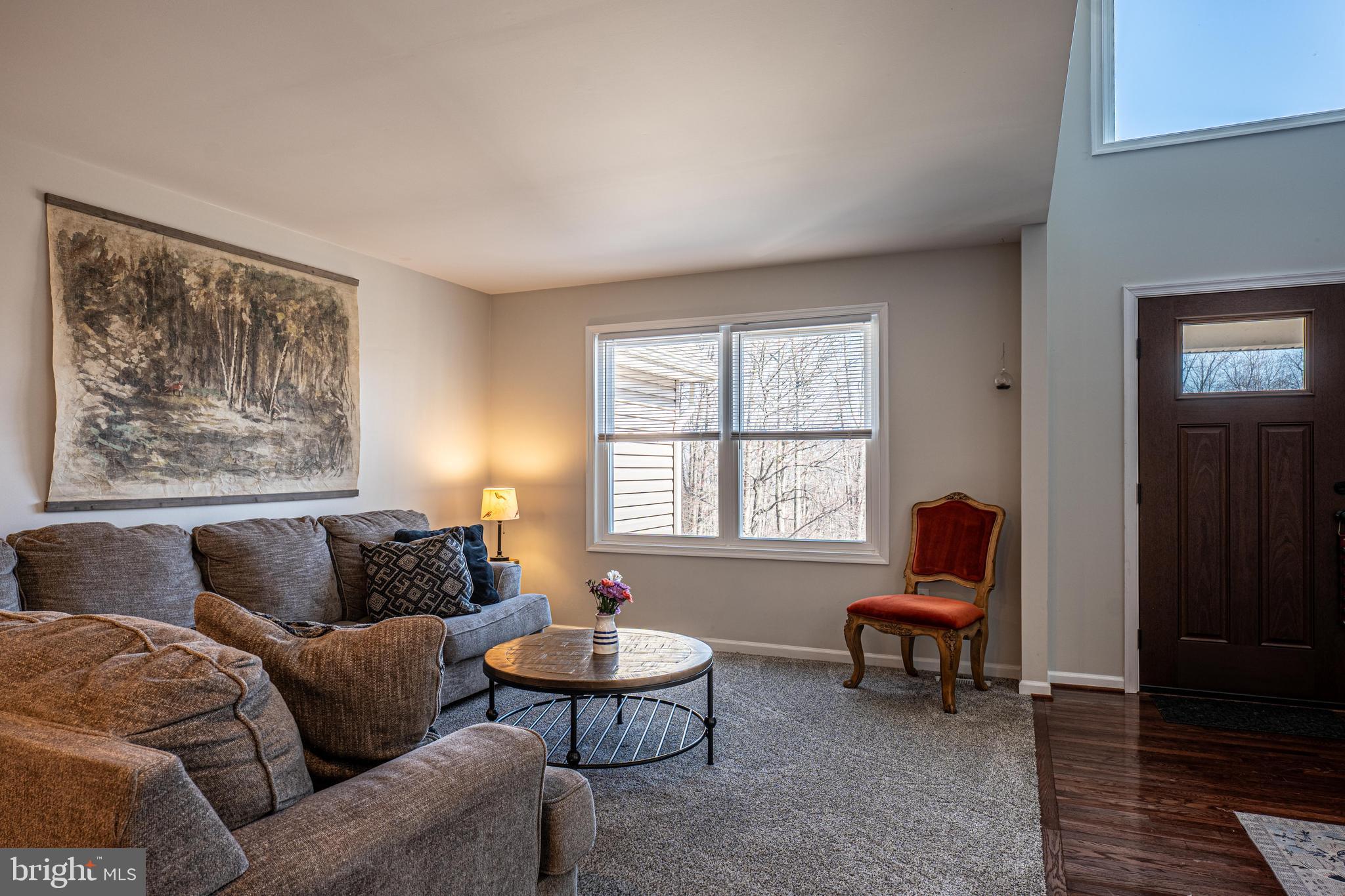 9833 Fox Road Frederick, MD 21702 - Photo 29 of 48 a living room with furniture and a window