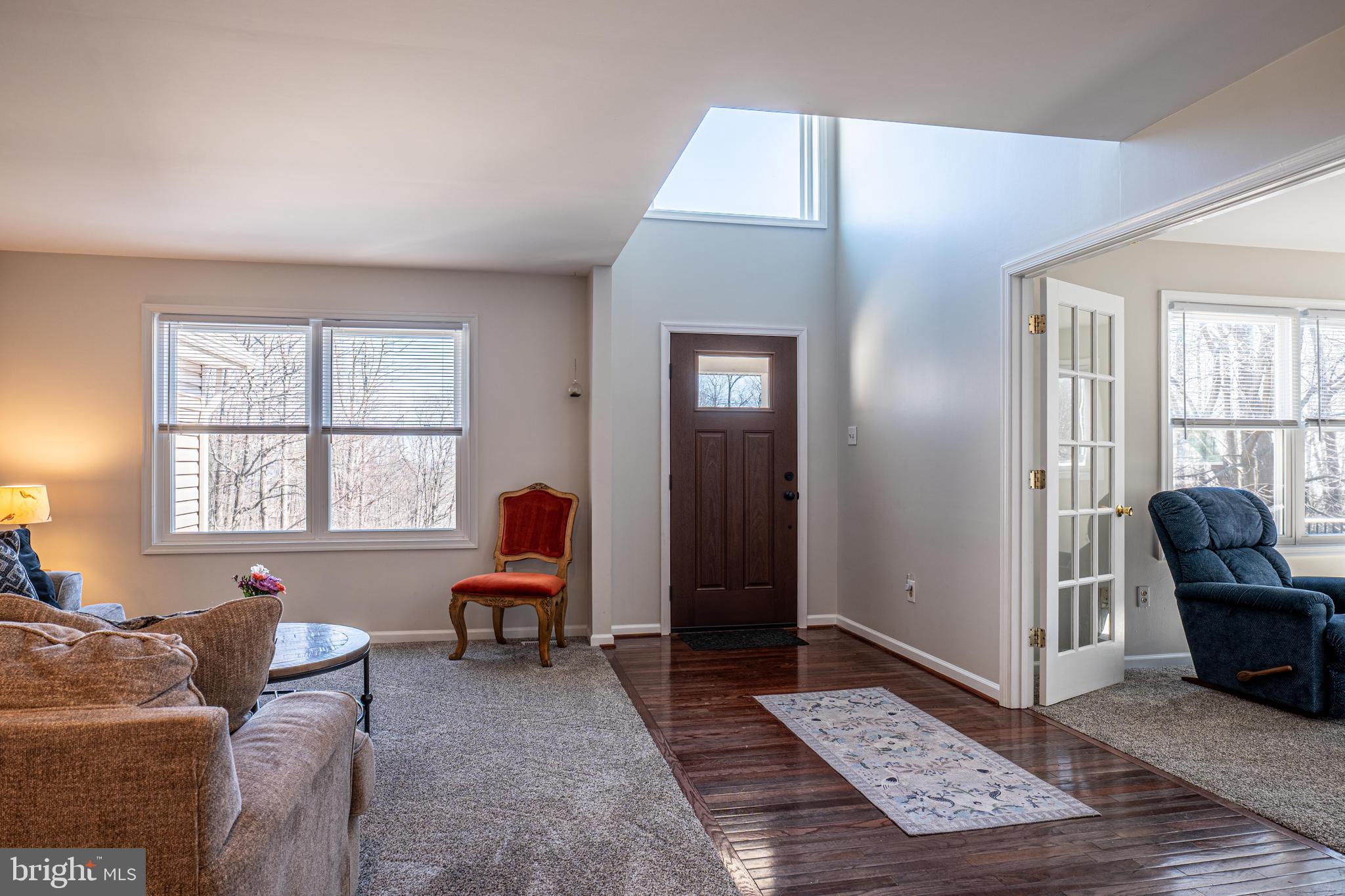 9833 Fox Road Frederick, MD 21702 - Photo 30 of 48 a living room with furniture and a window