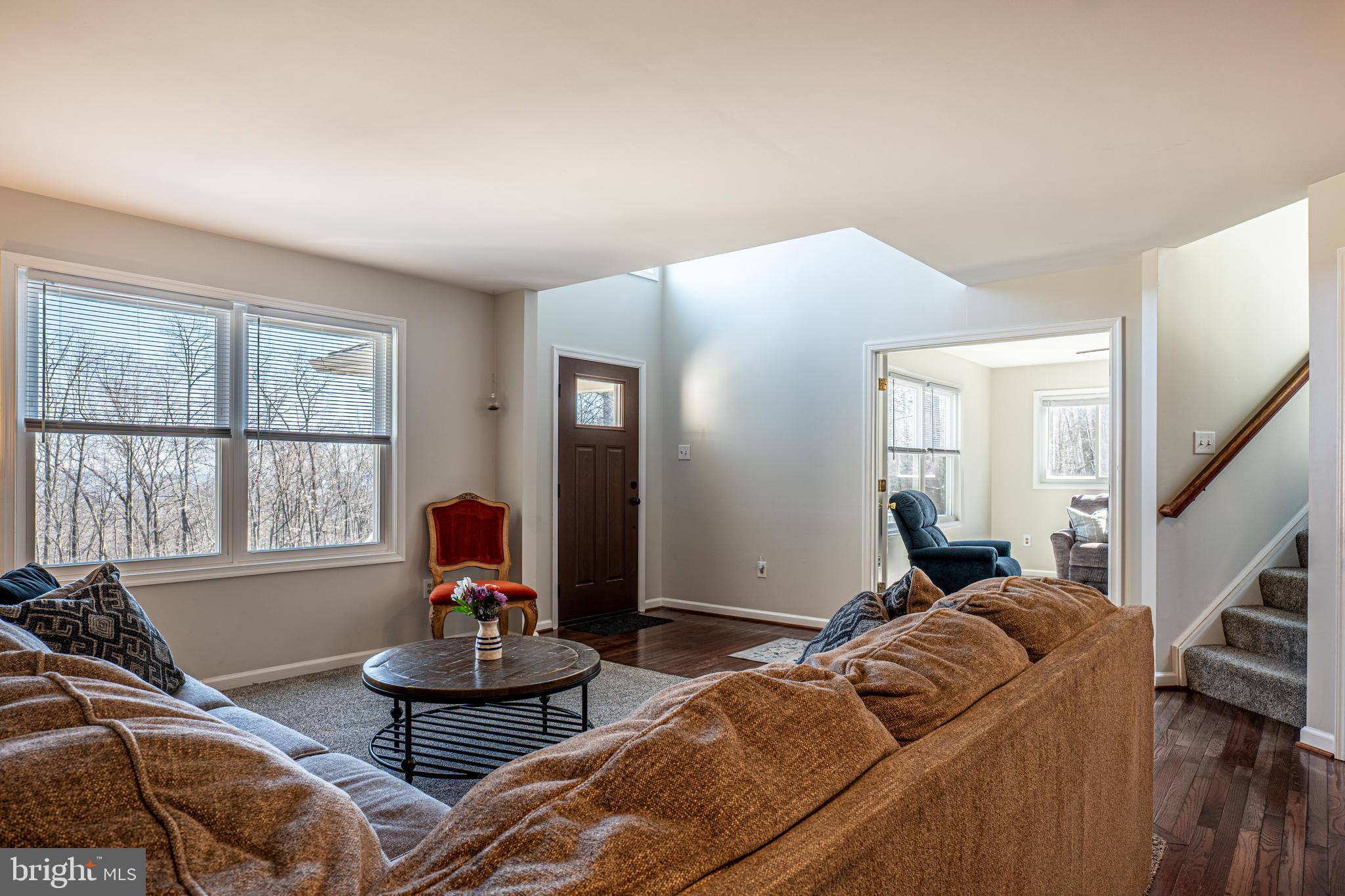 9833 Fox Road Frederick, MD 21702 - Photo 31 of 48 a living room with furniture and a large window