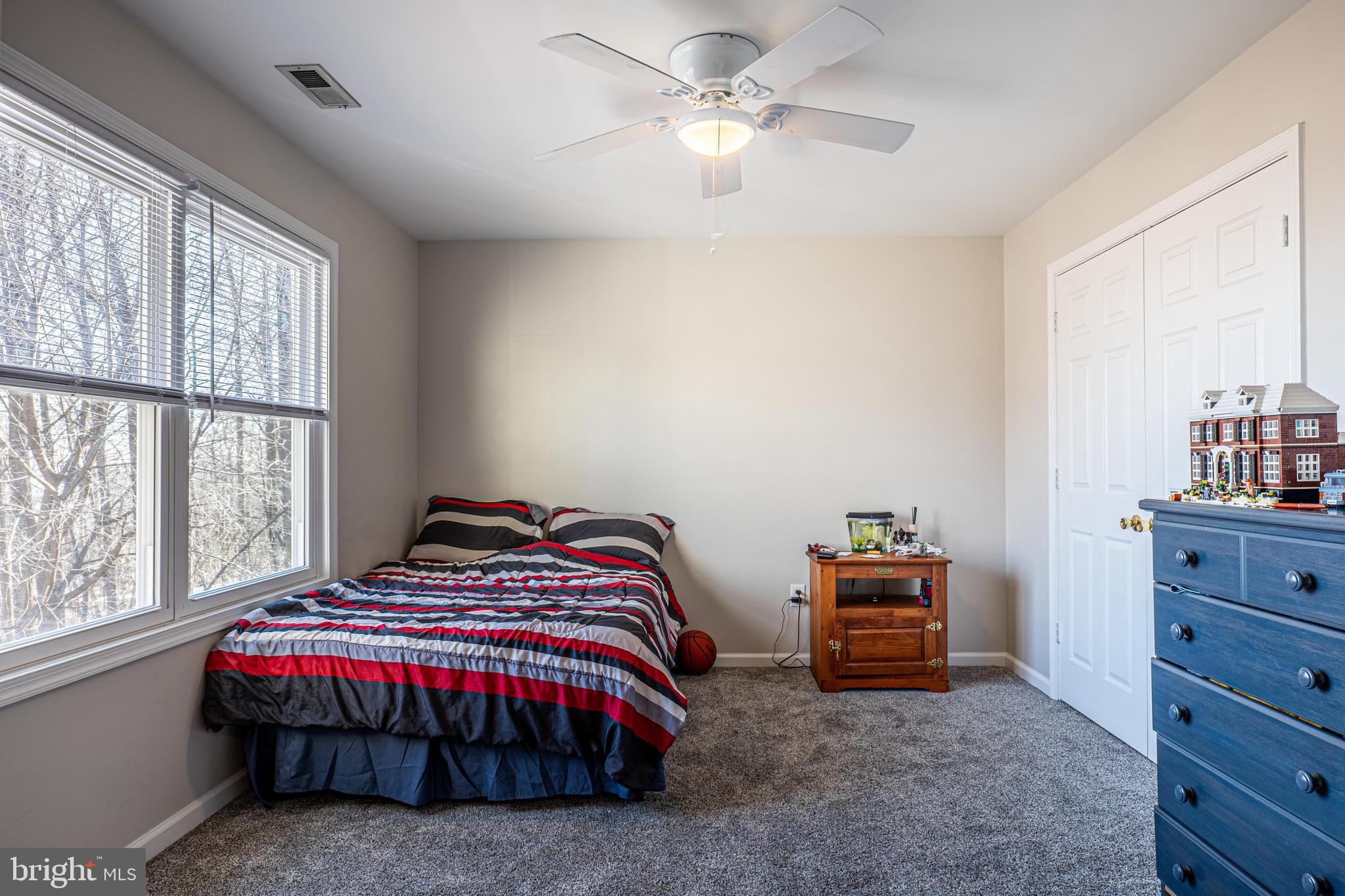 9833 Fox Road Frederick, MD 21702 - Photo 37 of 48 a bedroom with a bed and a closet