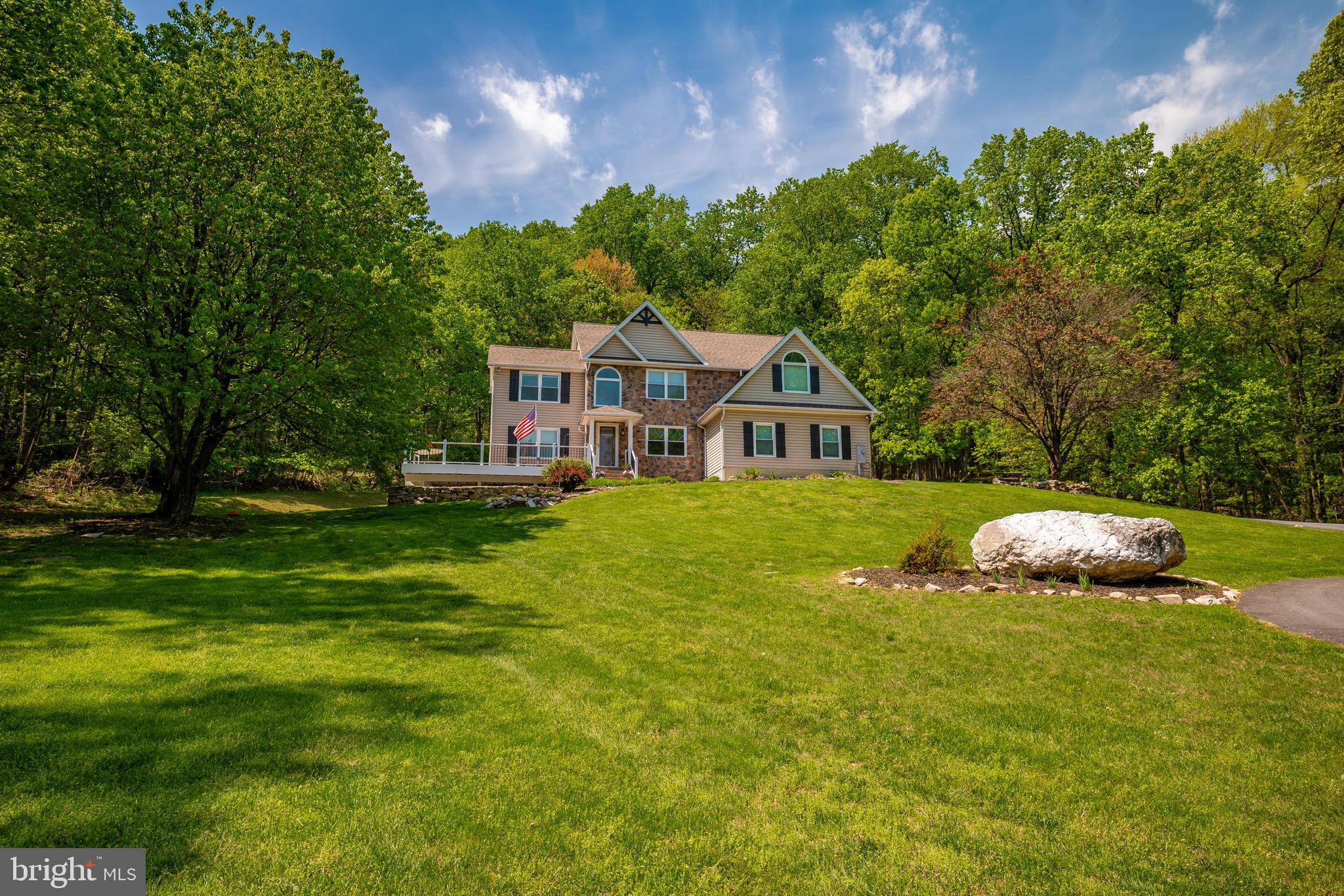 9833 Fox Road Frederick, MD 21702 - Photo 4 of 48 a front view of a house with garden