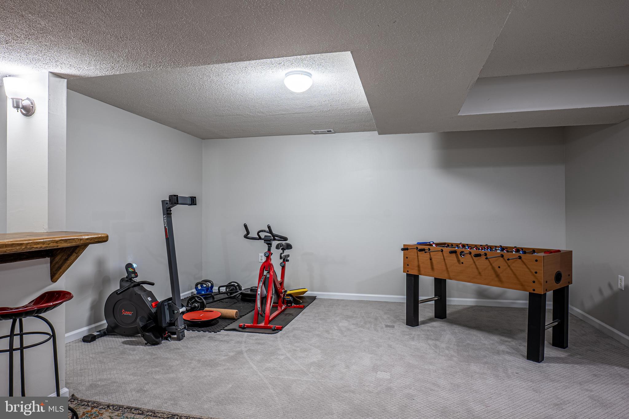 9833 Fox Road Frederick, MD 21702 - Photo 42 of 48 a view of a room with gym equipment