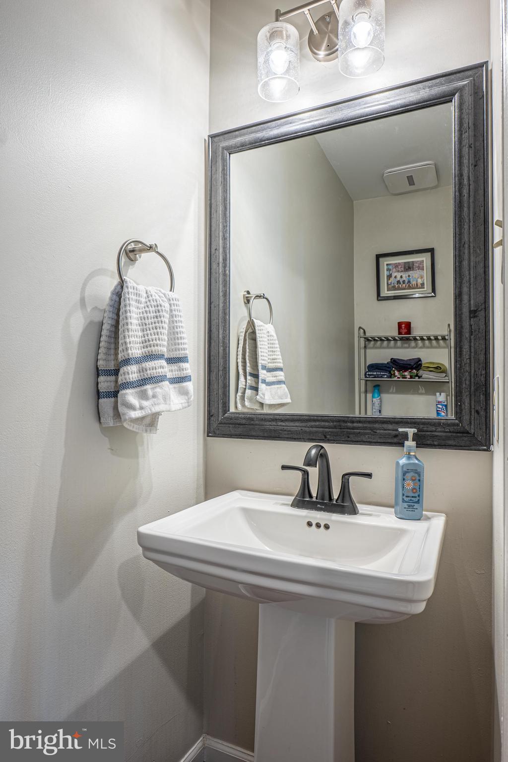 9833 Fox Road Frederick, MD 21702 - Photo 46 of 48 a bathroom with a sink and mirror