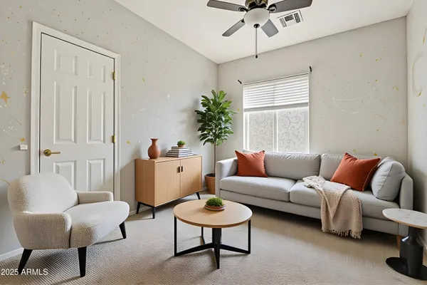 a workspace with a window and a potted plant