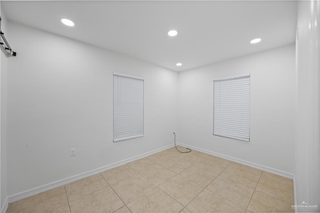 2902 Alejandra Street Mission, TX 78574 - Photo 11 of 17 an empty room with a workbench