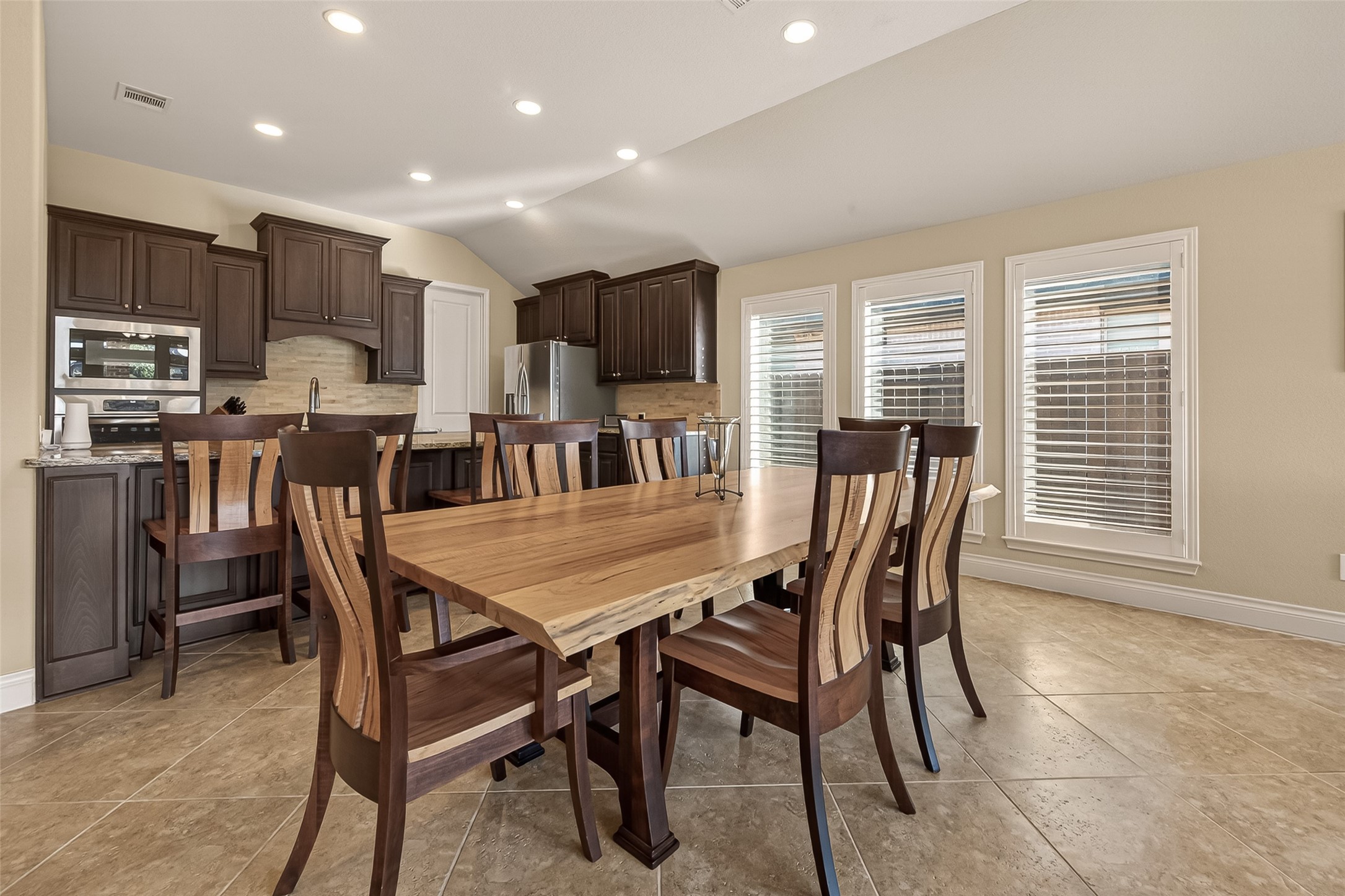 28435 Sycamore Falls Lane Fulshear, TX 77441 - Photo 12 of 46 a view of a dining room with furniture