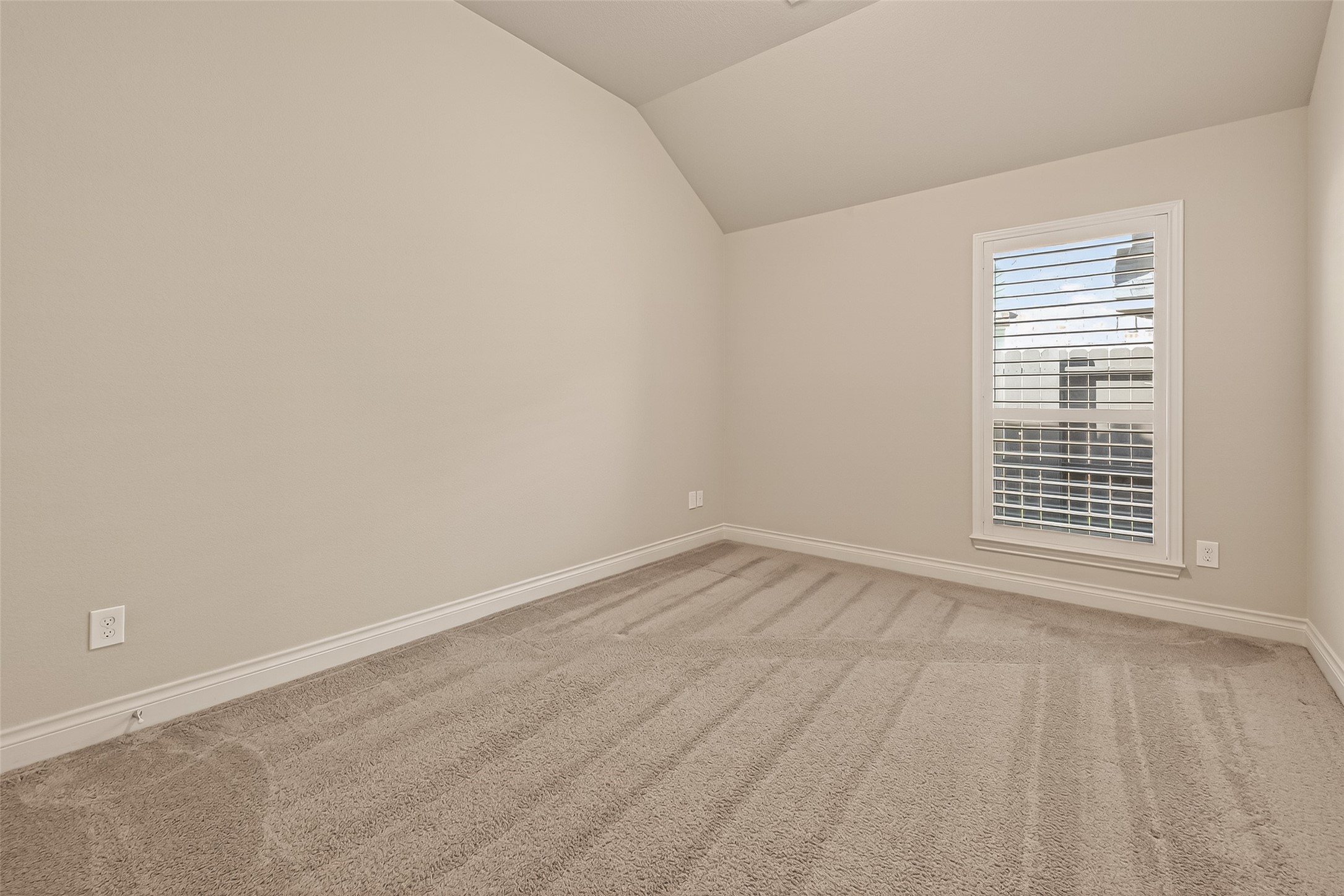 28435 Sycamore Falls Lane Fulshear, TX 77441 - Photo 31 of 46 a view of an empty room and a window