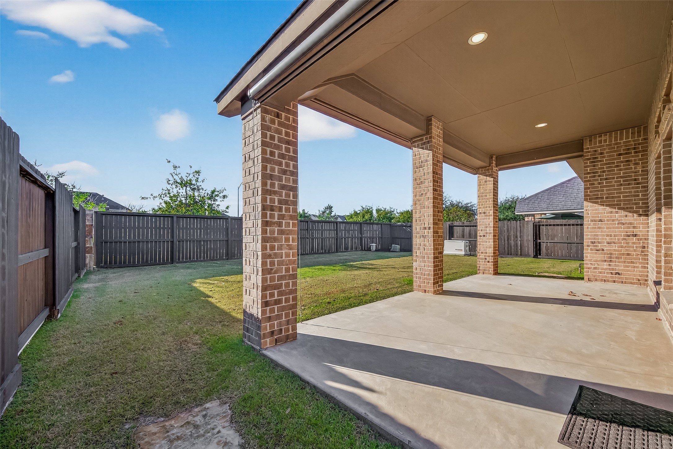 28435 Sycamore Falls Lane Fulshear, TX 77441 - Photo 43 of 46 a view of a backyard with wooden fence