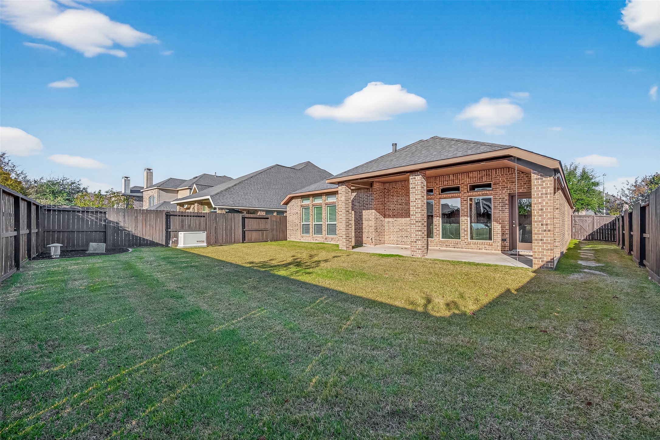 28435 Sycamore Falls Lane Fulshear, TX 77441 - Photo 44 of 46 a view of a house with a backyard