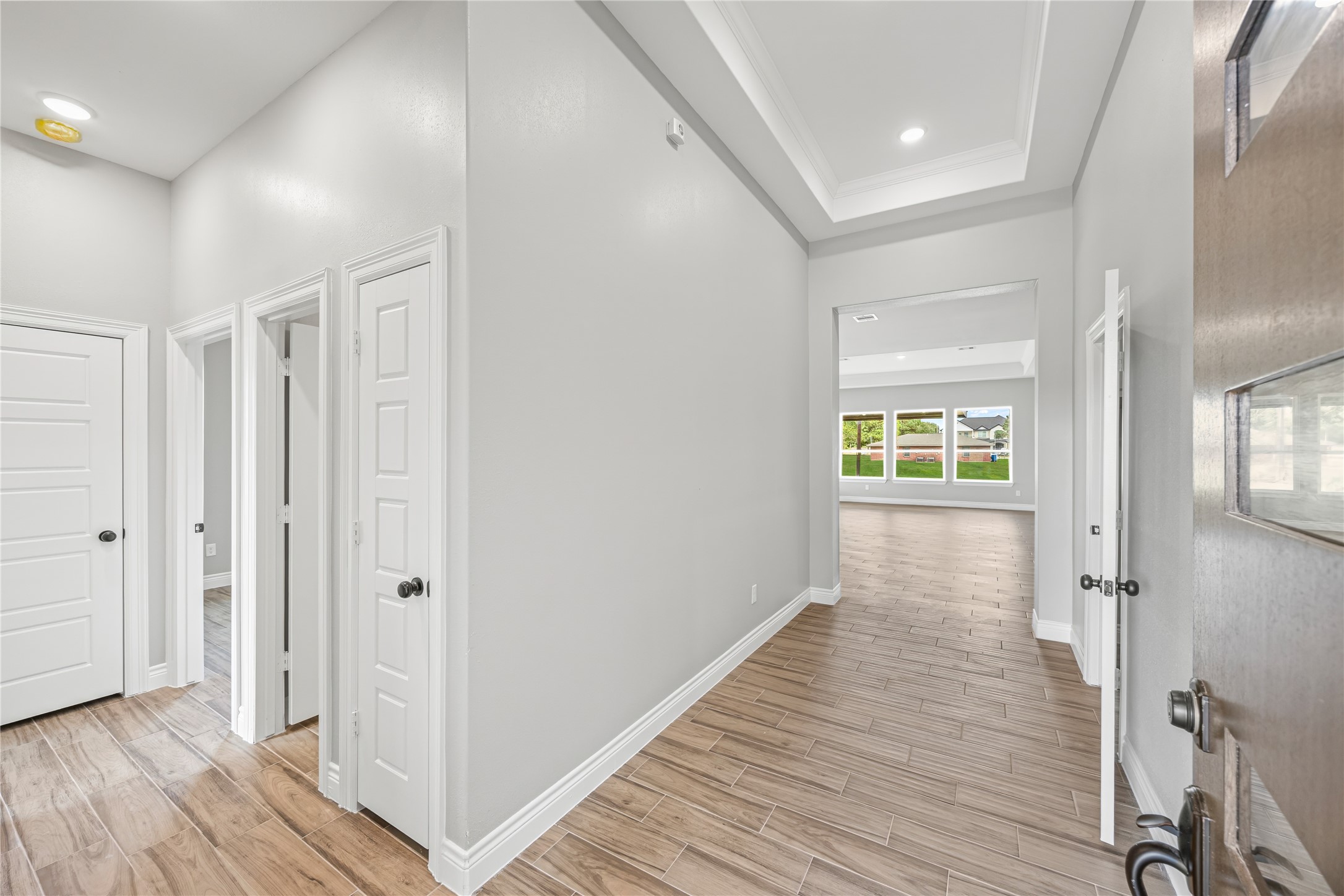 513 Oleander Street Waller, TX 77484 - Photo 25 of 28 a view of hallway with wooden floor