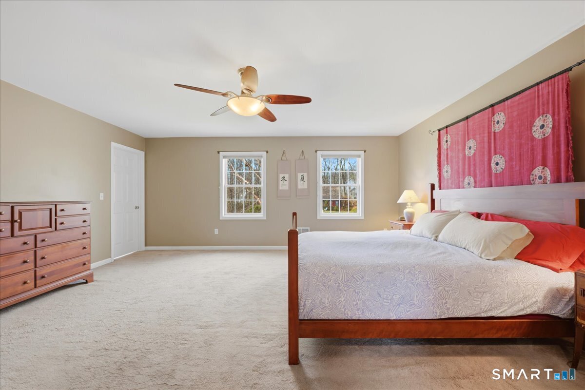 99 Sleepy Hollow Road East Lyme, CT 06357 - Photo 17 of 40 Primary suite with walk-in closet and spa-like full bath.