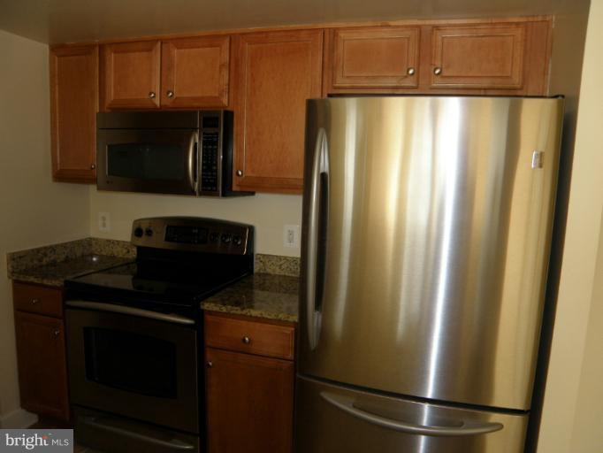 11800 Sunset Hills Road, Unit 608 Reston, VA 20190 - Photo 25 of 27 Kitchen2
