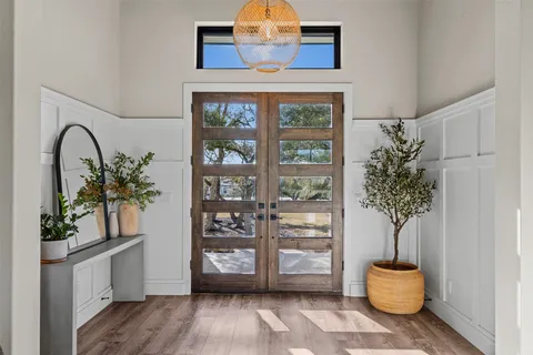 a view of living room with furniture and potted plant