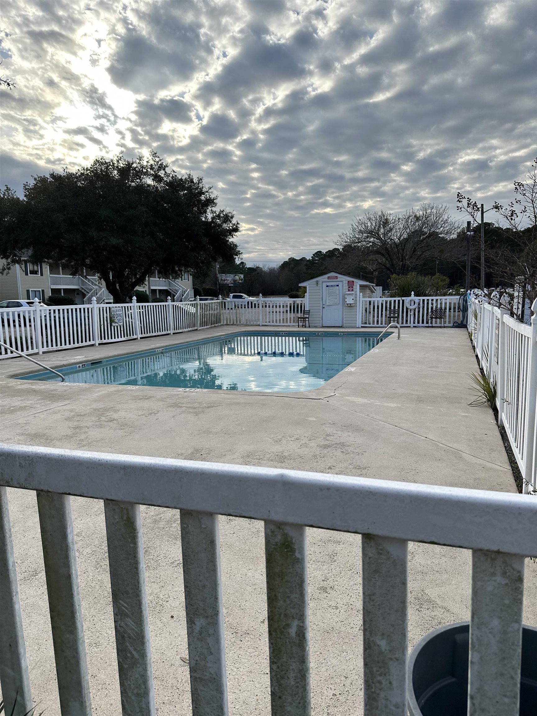 3555 Highway 544, Unit 18G Conway, SC 29526 - Photo 10 of 11 Community pool with a patio and an outbuilding