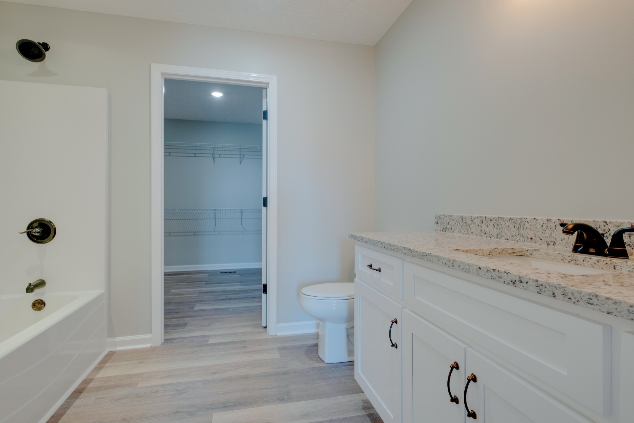 125 Vivian Lane Carthage, TN 37030 - Photo 17 of 30 a bathroom with a granite countertop sink toilet and shower