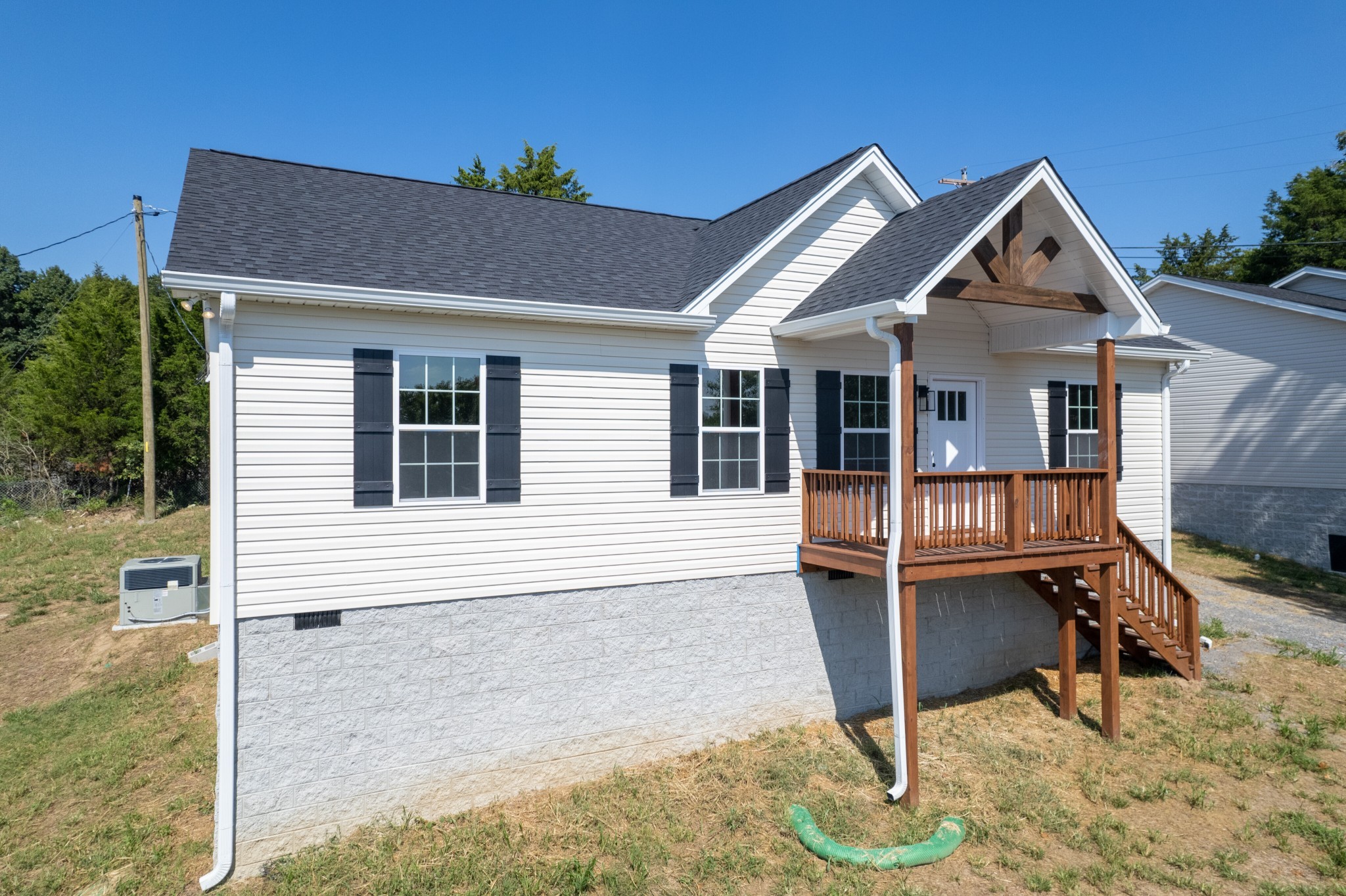 125 Vivian Lane Carthage, TN 37030 - Photo 2 of 30 a front view of a house with a yard