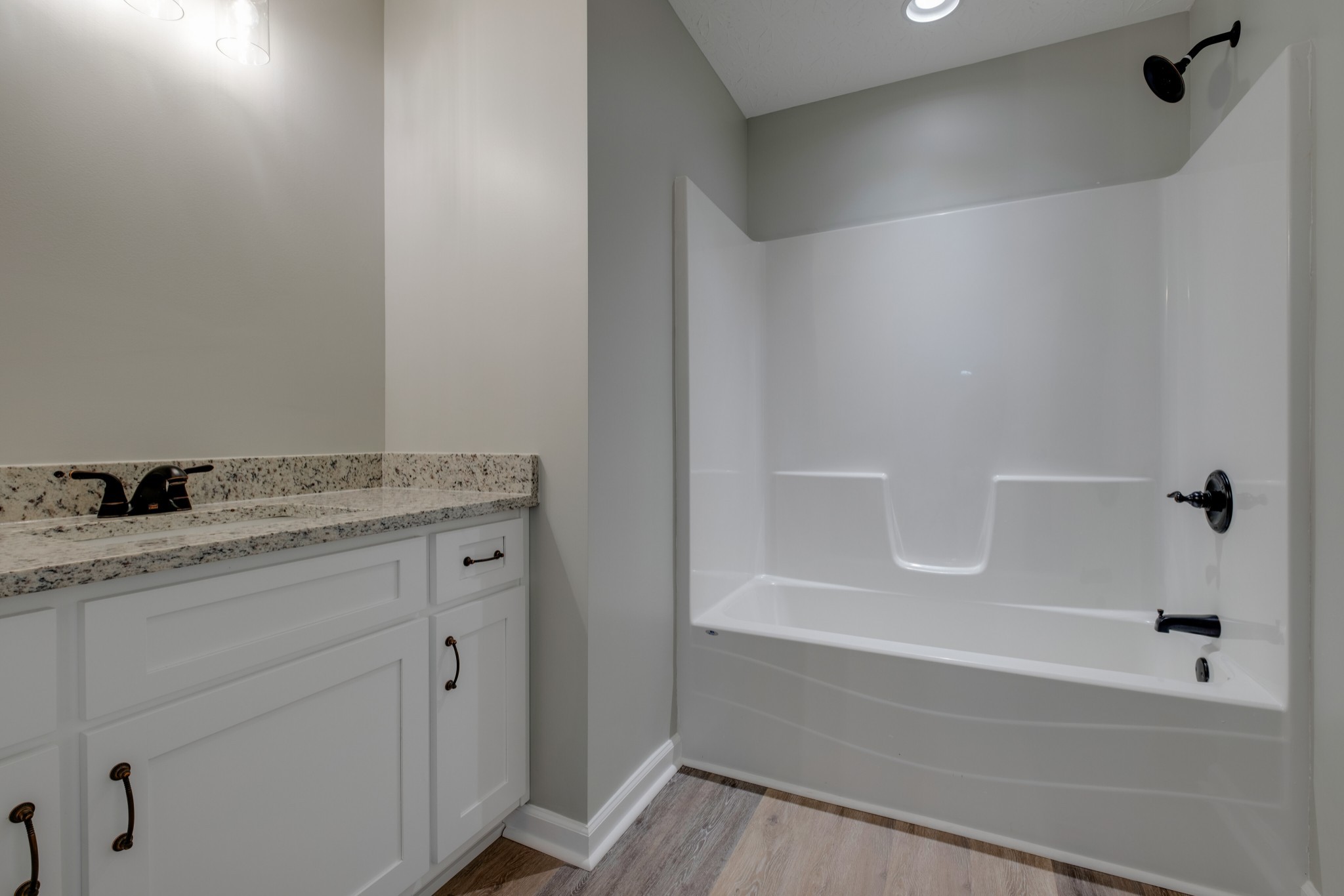 125 Vivian Lane Carthage, TN 37030 - Photo 23 of 30 a bathroom with a granite countertop sink toilet and shower