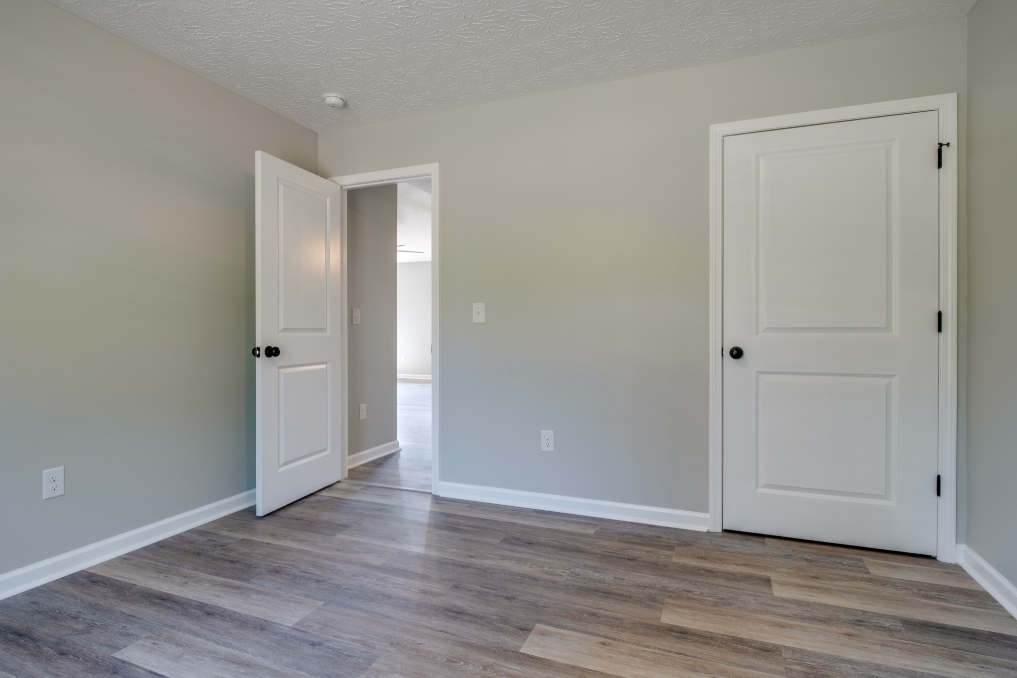 125 Vivian Lane Carthage, TN 37030 - Photo 26 of 30 a view of an empty room with wooden floor