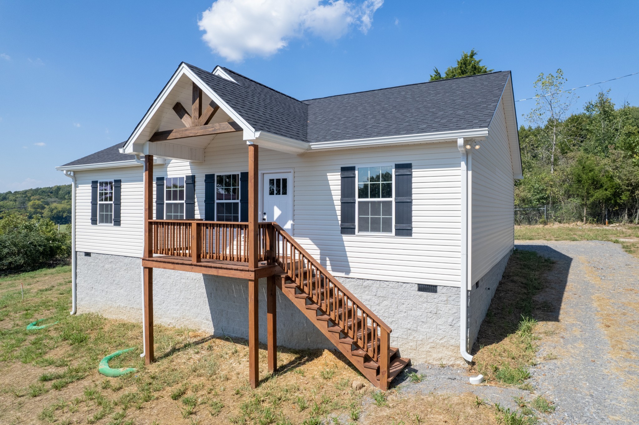 125 Vivian Lane Carthage, TN 37030 - Photo 3 of 30 a front view of a house with wooden fence