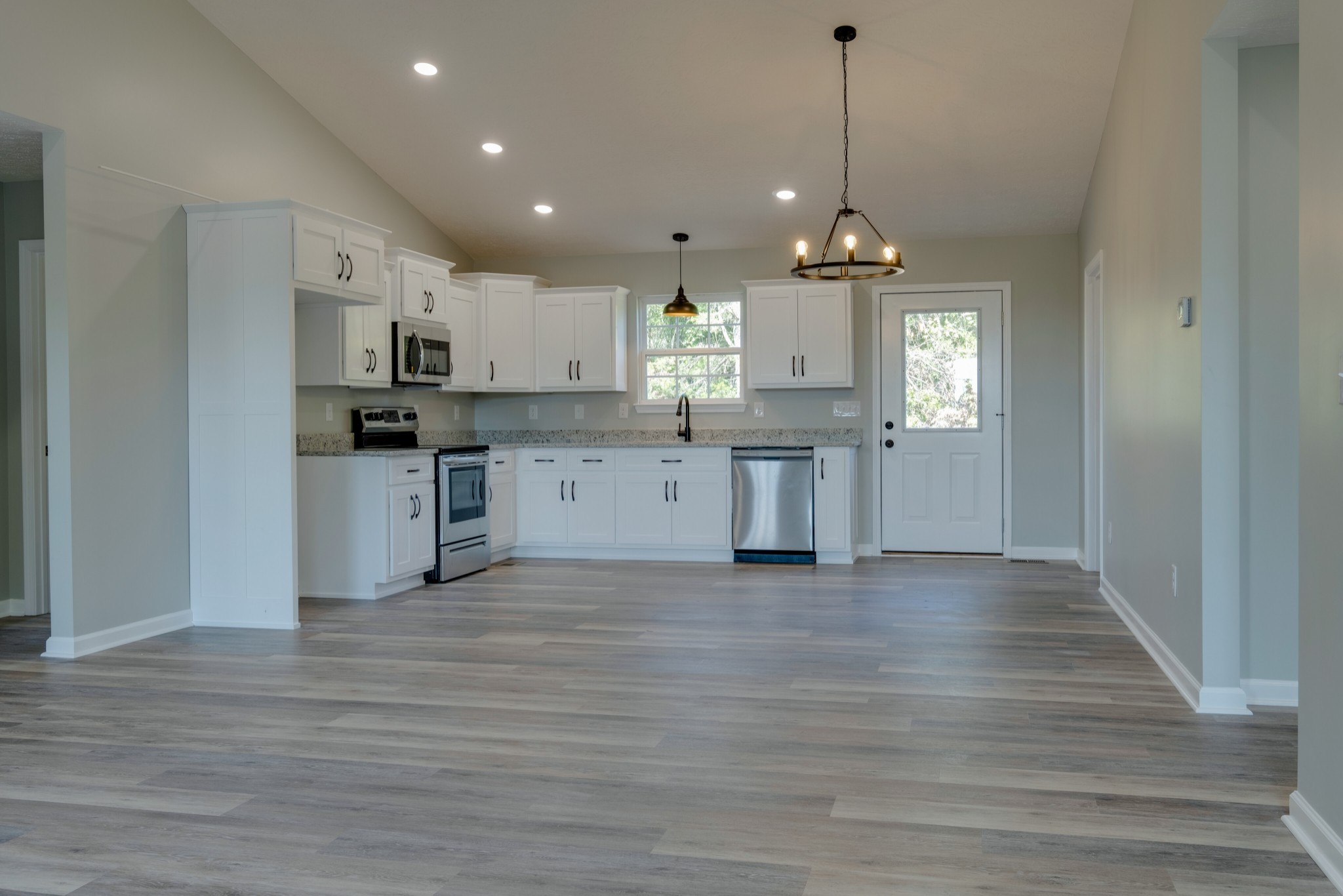 125 Vivian Lane Carthage, TN 37030 - Photo 8 of 30 a view of kitchen with sink microwave and refrigerator
