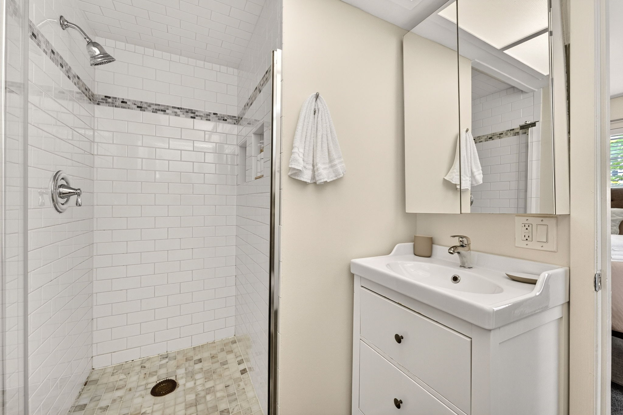 3604 Wilson Street Austin, TX 78704 - Photo 18 of 25 a bathroom with a shower sink and mirror