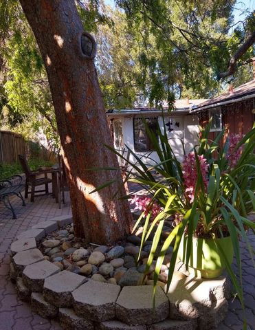a view of a table and chairs in patio