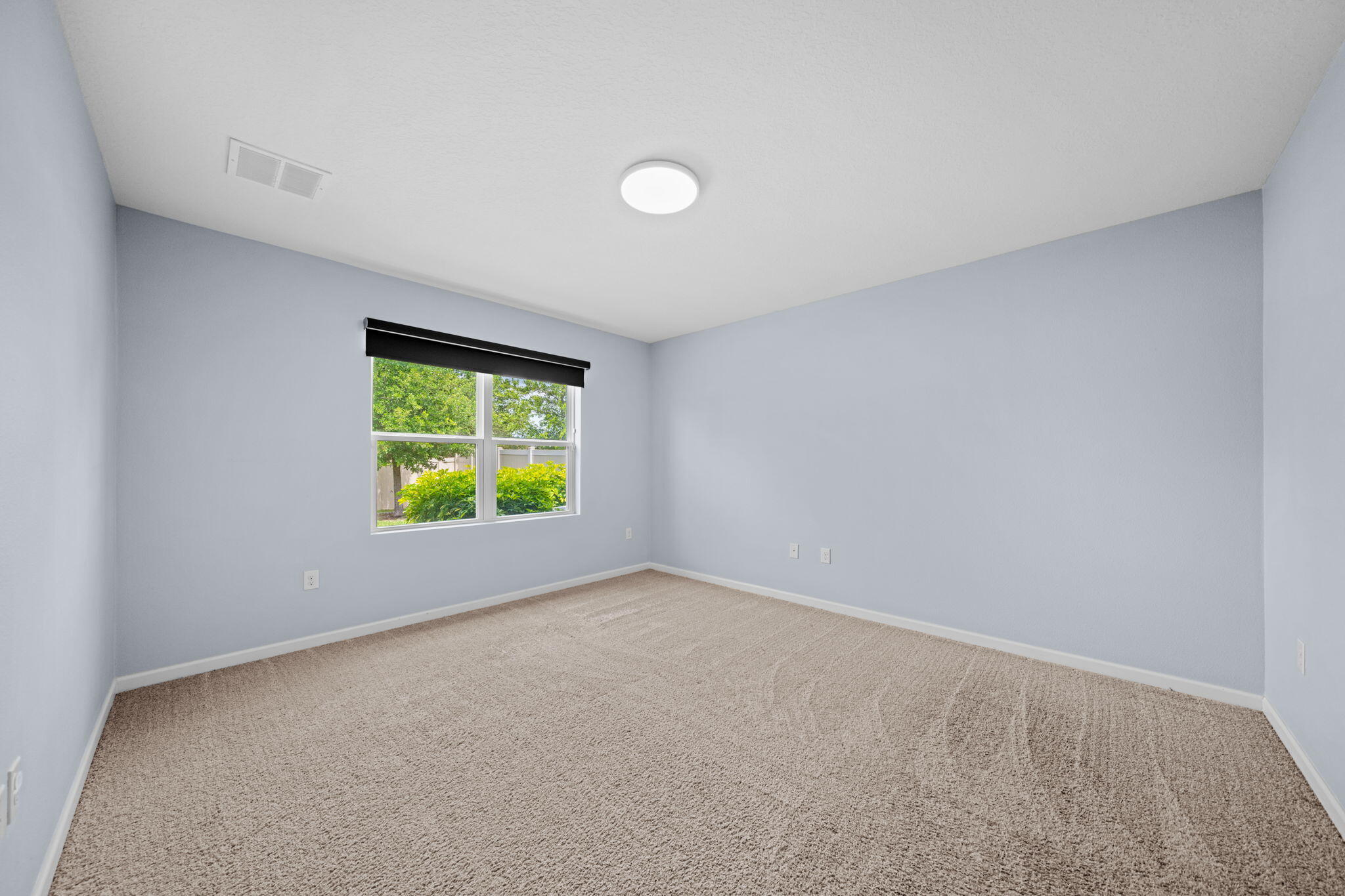820 Forest Trace Circle Titusville, FL 32780 - Photo 15 of 27 a view of an empty room with a window